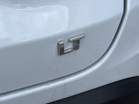 The 2025 Chevrolet Trax LT in Summit White is a stylish and practical subcompact SUV, designed to pr... (image 6)