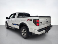 They say go big or go home! Our used 2013 Ford F-150 FX4 SuperCab 4X4 shown in Oxford White is one n... (image 2)