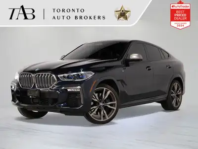 This 2020 BMW X6 M50i Coupe commands attention with aggressive styling, a powerful V8 engine, and re...