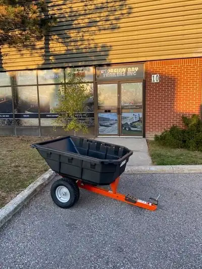 CALL JAMIE@437 882-1953 12.5 Cu. Ft. Poly Swivel Dump Cart Upon activation of the step-on dump relea...