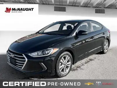 The 2017 Hyundai Elantra in Space Black Pearl features heated front seats, a heated leather steering...