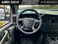 The Chevrolet Express Cargo Van 2500, dressed in a pristine white coat, is purpose-built for those w... (image 8)