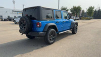 This 2025 JEEP WRANGLER 4-DOOR SPORT has the following options Cloth Low-Back Bucket Seats, Apple Ca... (image 8)