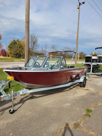 THIS 2025 LOADED UP AND GORGEOUS RH ALUMINUM BOATS HEAVY GAUGE ALL WELDED BOAT IS IN STOCK AND READY...