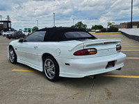 Unleash raw American muscle this summer with this stunning 2002 Chevrolet Camaro Z28 Convertible. Po... (image 6)