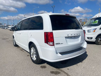 Hop aboard the 2020 Dodge Caravan Premium Plus 3.6L, the minivan that turns family hauls into a full... (image 2)