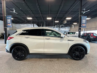 Drive our 2022 INFINITI QX50 SENSORY AWD and dare to defy the status quo in White! Powered by a Turb... (image 5)