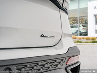 This Volkswagen Taos boasts a Intercooled Turbo Regular Unleaded I-4 1.5 L/91 engine powering this A... (image 9)