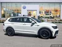 This Volkswagen Tiguan delivers a Intercooled Turbo Regular Unleaded I-4 2.0 L/121 engine powering t... (image 2)