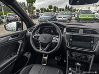This Volkswagen Tiguan boasts a Intercooled Turbo Regular Unleaded I-4 2.0 L/121 engine powering thi... (image 8)
