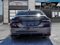 CAMRY XSE FEATURES AWD, 19-INCH WHEELS, AND DUAL EXHAUST. INSIDE, IT OFFERS A LEATHER-TRIMMED INTERI... (image 2)