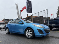 Check out this 2011 Mazda MAZDA3 Hatchback! With a sleek blue exterior and spacious interior, this c... (image 3)
