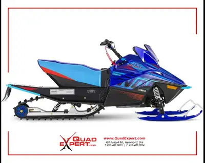 The Snoscoot is an easy-to-ride electric-start, four-stroke, 200cc-class snowmobile for younger, sma...