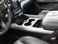 The 2021 Ram 1500 Rebel is a bold, off-road-focused full-size truck with a 5.7L HEMI V8 producing 39... (image 8)