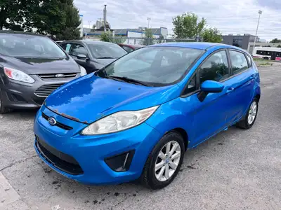 Engine: Moteur à 4 cylindres 1.6L/97CI L/100Km City: 6.9 L/100Km Hwy: 5.1 Safety Equipment Système d...