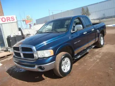 NORTH POINT MOTORS...CALL TEXT 780-224-7791 CHECK OUT THIS 04 DODGE RAM 1500 QUAD CAB SLT 4X4. $5999...