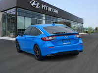 he 2023 Honda Civic Sport Touring Hatchback offers a dynamic blend of performance, style, and advanc... (image 6)