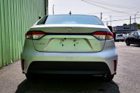 This 2024 Toyota Corolla is for sale today. This low mileage sedan has just 10,822 kms. It's silver... (image 4)