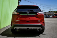 This 2020 Ford Edge is for sale today. This SUV has 68,872 kms. It's red in colour . It has a 8 spee... (image 4)
