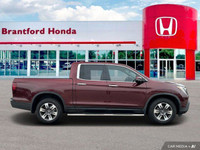 This 2019 Honda Ridgeline Touring Crew Cab Pickup boasts a powerful engine and a luxurious interior,... (image 6)