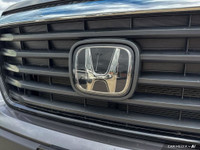 The 2021 Honda Ridgeline Touring offers a premium blend of comfort, technology, and utility. Equippe... (image 7)