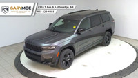 The 2025 Jeep Grand Cherokee L Limited 4x4, in a sophisticated gray, is designed to offer a commandi... (image 8)