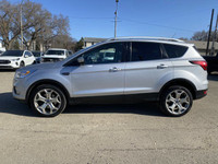 **WE WILL BEAT ANY DEALER IN THE CITY** Ingot Silver Metallic 2019 Ford Escape Titanium 4WD 6-Speed... (image 1)