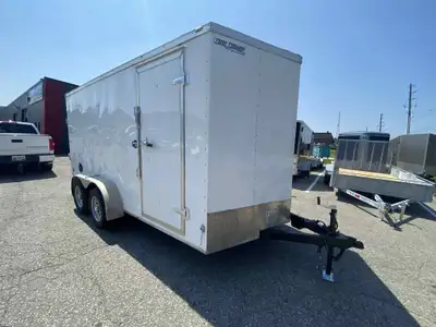 - Ramp door - 6’6” interior height - Durable steel frame - Brand new tires - 2-5/16” ball hookup htt...