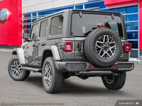 This Jeep Wrangler has a dependable Regular Unleaded V-6 3.6 L/220 engine powering this Automatic tr... (image 5)