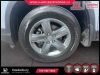The 2023 Honda Ridgeline Touring is a versatile and luxurious midsize pickup truck that combines rug... (image 6)