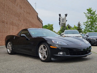 This isn’t just a car—it’s a statement. Draped in sleek black-on-black with polished chrome wheels t... (image 9)