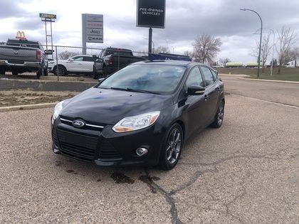 2014 Ford Focus WINTER TIRES & RIMS, LEATHER, ROOF, LOW KM'S! #2 in Cars & Trucks in Medicine Hat