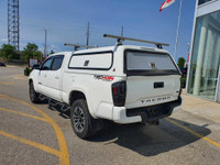 Check out this 2020 Toyota Tacoma 4x4 Double Cab Auto with 59,334 KMS, finished in a sleek White ext... (image 5)