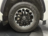 The elegance of White paired with a stately Black interior, the 2024 Toyota Sequoia TRD Off-Road awa... (image 9)