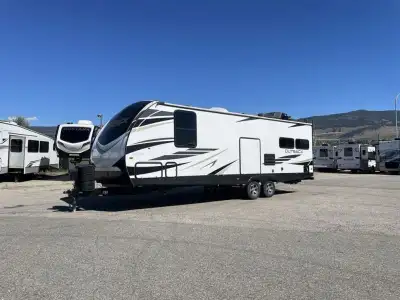 Keystone Outback Ultra Lite travel trailer 260UML highlights: Middle Living Area Rear Kitchen Large...