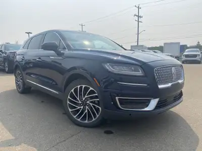 Under the glistening Rhapsody Blue exterior, the 2019 Lincoln Nautilus Reserve stands as a testament...