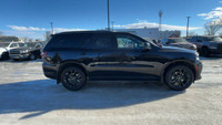 This Dodge Durango is equipped with: Cloth Bucket Seats w/Shift Insert, 7-Passenger Seating, Front H... (image 4)