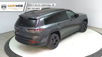 The 2025 Jeep Grand Cherokee L Limited 4x4, in a sophisticated gray, is designed to offer a commandi... (image 9)