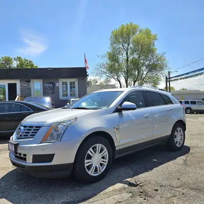 This 2014 Cadillac SRX is a luxurious and spacious SUV with all the features you need for a comforta...