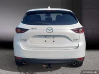 Le Mazda CX-5 GS AWD 2021 est un VUS intermédiaire qui se distingue par son design élégant, sa condu... (image 5)