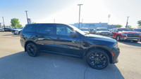 This Dodge Durango is equipped with: Cloth Bucket Seats, Power Sunroof, Heated Front Seats, Heated S... (image 9)