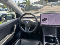 This Tesla Model Y delivers a Electric engine powering this Automatic transmission. Window Grid Ante... (image 8)