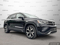 Command attention with the 2022 Volkswagen Taos Highline SUV. This sleek black beauty boasts a panor... (image 8)