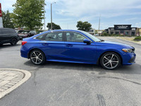 Experience the thrill of effortless driving with this 2022 Honda Civic Sedan Touring, boasting a sle... (image 3)