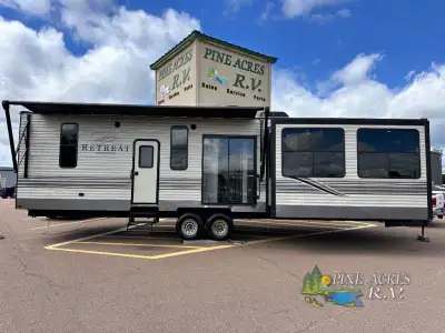 Keystone Retreat 391MBNK destination trailer highlights: Four Slide Outs Two Bedrooms Front Entertai...