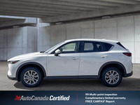 This 2025 Mazda CX-5 boasts a pristine white exterior and is ready for its next adventure, a fresh t... (image 3)