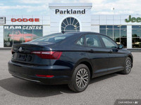 This Volkswagen Jetta boasts a Intercooled Turbo Regular Unleaded I-4 1.4 L/85 engine powering this... (image 4)