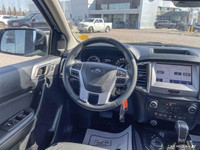 This 2021 Ford Ranger 4x4 Crew Cab, Velocity Blue with a sleek black interior, is ready for adventur... (image 8)