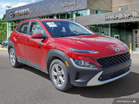 This 2022 Hyundai Kona Preferred SUV boasts a vibrant Pulse Red exterior and a sleek black interior.... (image 6)