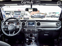 This Jeep Wrangler Sport 4x4 has a dependable Gas/Electric V-6 3.6 L/220 engine powering this Automa... (image 1)